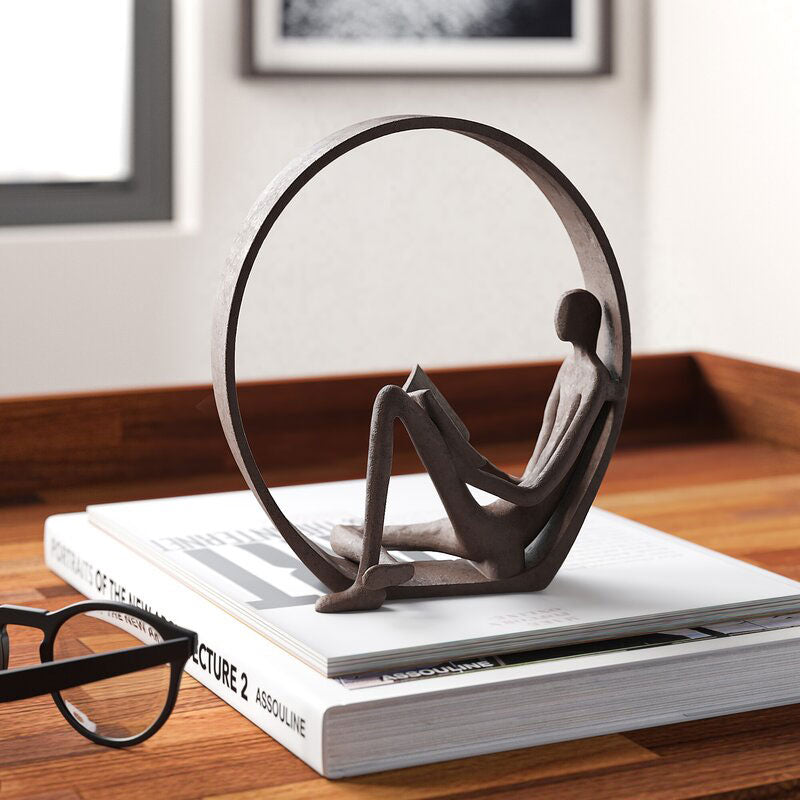 Iron Reader Sculpture