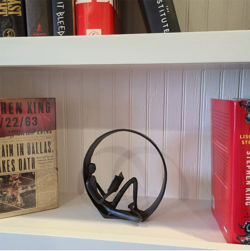 Iron Reader Sculpture