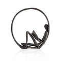 Iron Reader Sculpture